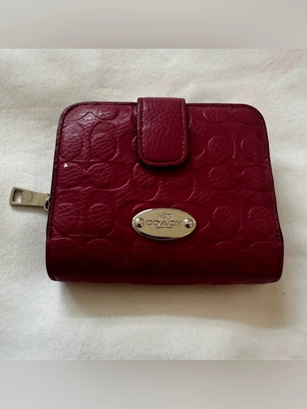 Coach Signature Embossed Pebble Leather Medium Zip Around Wallet in Sunset Red